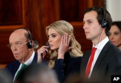 Commerce Secretary Wilbur Ross, Ivanka Trump and senior presidential adviser Jared Kushner listen during a news conference with President Donald Trump and German Chancellor Angela Merkel in the East Room of the White House in Washington, March 17, 2017.