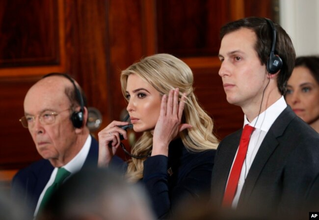 Commerce Secretary Wilbur Ross, Ivanka Trump and senior presidential adviser Jared Kushner listen during a news conference with President Donald Trump and German Chancellor Angela Merkel in the East Room of the White House in Washington, March 17, 2017.