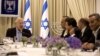 Israeli President Reuven Rivlin, left, speaks during consultations with representatives of the Joint List, right, an alliance of four small Arab-backed parties, to hear whom they would recommend for prime minister at his residence in Jerusalem, March 22, 