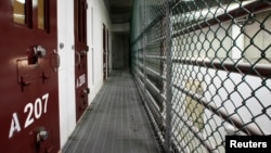 The interior of an unoccupied communal cell block is seen at Camp VI, a prison used to house detainees at the U.S. Naval Base at Guantanamo Bay March 5, 2013. 