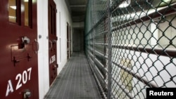 The interior of an unoccupied communal cell block is seen at Camp VI, a prison used to house detainees at the U.S. Naval Base at Guantanamo Bay March 5, 2013. 