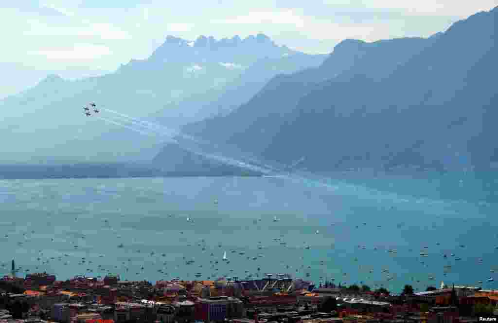 F-5 Tigers of the Swiss Air Force Patrouille de Suisse perform a show on Swiss National Day in Vevey, Switzerland.
