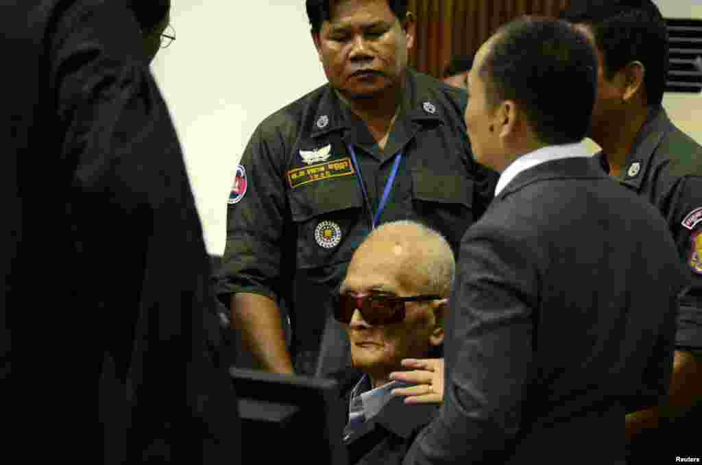 Former Khmer Rouge leader &quot;Brother Number Two&quot; Nuon Chea sits inside the courtroom of the Extraordinary Chambers in the Courts of Cambodia (ECCC) as he waits for a verdict, in Phnom Penh, Cambodia.