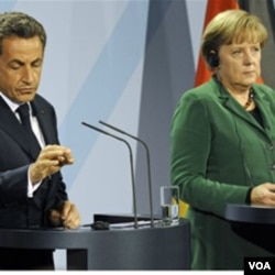 Presiden Perancis Nicolas Sarkozy (kiri) dan Kanselir Jerman Angela Merkel (foto:dok) menyambut baik kabar tewasnya mantan pemimpin Libya Moammar Gaddafi.