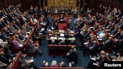 FILE - Britain's House of Lords is seen in session, in London, Sept. 5, 2016. Lawmakers want to know whether there was any British government involvement in or knowledge of the intelligence allegations against U.S. President-elect Donald Trump.