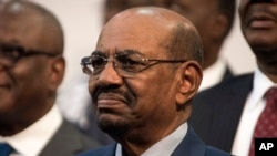 FILE - Sudanese President Omar al-Bashir is seen during the opening session of the AU summit in Johannesburg, June 14, 2015. 