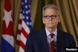 Jeffrey DeLaurentis, U.S. Charge d'Affaires in Cuba, delivers a speech after signing agreements to cooperate on air and maritime search and rescue missions in the Florida Straits, Havana, Cuba, Jan. 18, 2017.