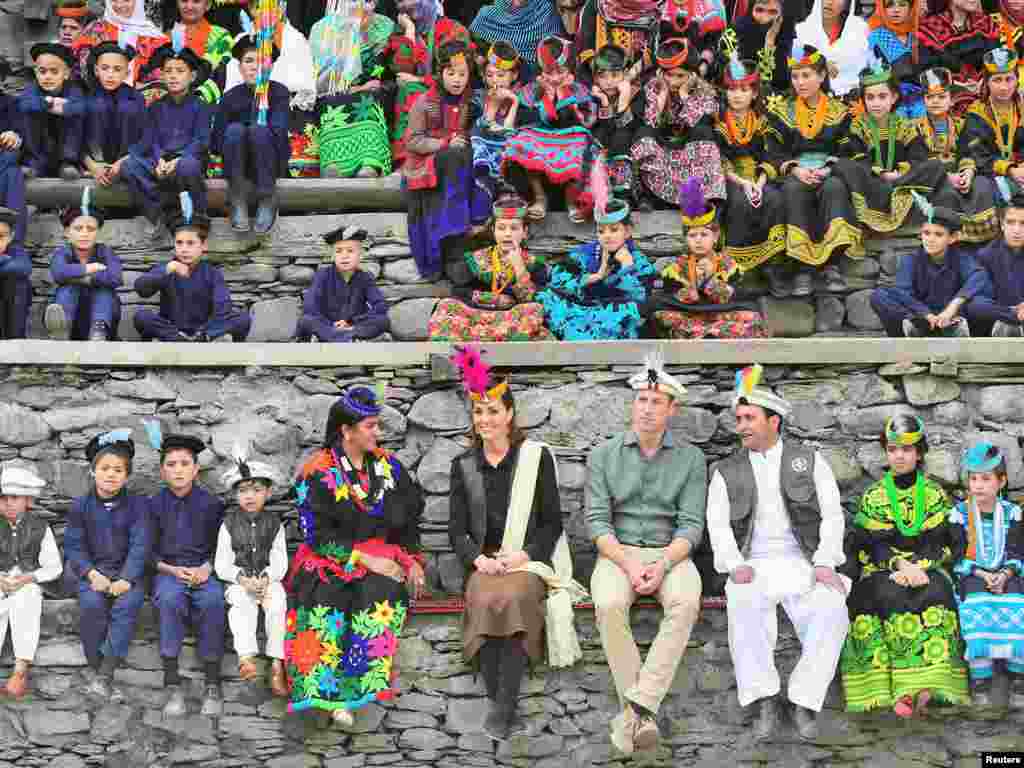 Britain&#39;s Prince William and Catherine, Duchess of Cambridge visit a settlement of the Kalash people in Chitral, Pakistan.
