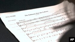 This photo the full score for "The Most Beautiful Time of Life (Die Schönste Zeit des Lebens)" at the Duderstadt Center recording studio on campus in Ann Arbor, Mich. (Christopher Boyes/University of Michigan via AP)