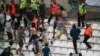 Soccer fans clash in Stade Velodrome, in Marseille, after a match, June 11, 2016. 