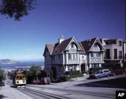 A San Francisco cable car - the nation’s only moving national monument, ascends hilly Hyde Street.
