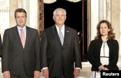 German Foreign Minister Sigmar Gabriel (L), U.S. Secretary of State Rex Tillerson (C) and Canada's Foreign Affairs Minister Chrystia Freeland, pose for a family photo during a G7 for foreign ministers in Lucca, Italy, April 10, 2017.