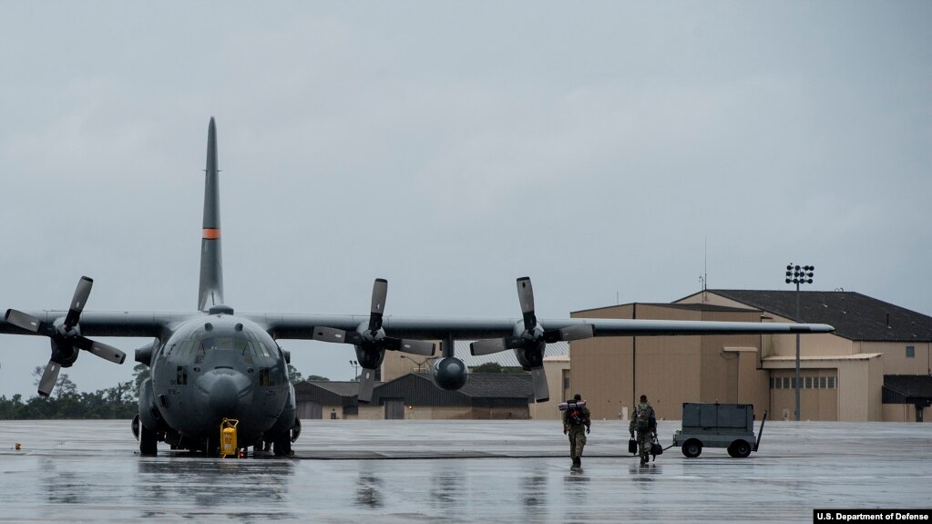 Servicemen from the California National Guard and the Oregon Air National Guard load onto a Texas Air National Guard C-130H Hercules at Hurlburt Field, Florida, Sept. 11, 2017. Supplies, equipment and personnel were transported to the Florida Keys to help