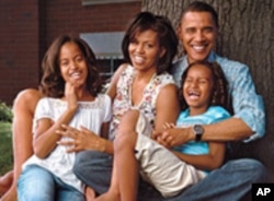 O Presidente Obama com a mulher, Michelle, e as filhas, Malia e Sasha.