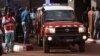 ARCHIVES - Une ambulance devant un hôtel, après une attaque menée par des hommes armés à Bamako, au Mali, vendredi 20 novembre 2015.