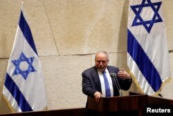 Former Israel's Defense Minister Avigdor Lieberman speaks in the plenum at the Knesset, Israel's parliament, in Jerusalem, May 29, 2019.