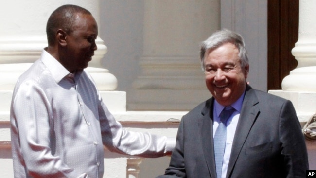 U.N. Secretary-General Antonio Guterres, right, shakes hands with Kenyan President Uhuru Kenyatta after holding a joint news conference at the State House in Nairobi, Kenya, March 8, 2017. ﻿﻿﻿Guterres has called for more stable funding and support for African Union troops in Somalia, who are preventing extremists from taking over the country.