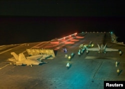 An F/A-18E Super Hornet launches from the flight deck of the Nimitz-class aircraft carrier USS Abraham Lincoln in the Red Sea, May 10, 2019.