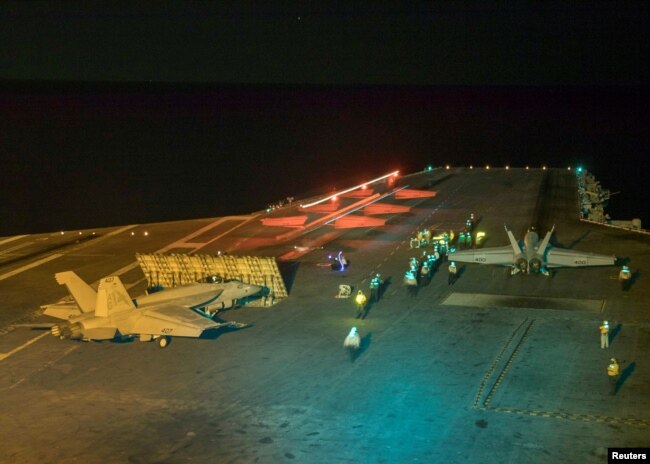 An F/A-18E Super Hornet launches from the flight deck of the Nimitz-class aircraft carrier USS Abraham Lincoln in the Red Sea, May 10, 2019.