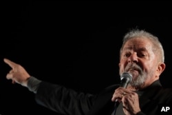 FILE - Brazil's former President Luiz Inacio Lula da Silva addresses supporters gathering to protest his conviction in Sao Paulo, Brazil, July 20, 2017.
