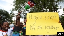 FILE - Kenyan gay and lesbian organisations demonstrate outside the Nigerian High Commission in Nairobi after Nigeria passed a restrictive anti-gay law, Feb. 7, 2014. 