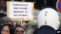 Supporters of Congolese opposition leader Etienne Tshisekedi, who has rejected results declaring President Joseph Kabila the winner, demonstrate in Brussels, December 10, 2011.