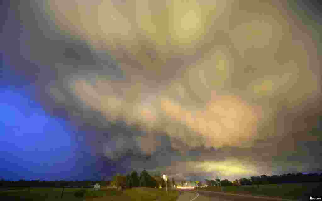 A thunderstorm supercell passes over the area with the potential of becoming a tornado, Hampton, Arkansas, April 24, 2014.