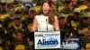 FILE - Kentucky Democratic Senatorial candidate Alison Lundergan Grimes speaks to a group of supporters, including members of the United Mine Workers Association.