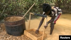 Villager searches for diamonds in gravel near mine outside of Sam Ouandja, northeastn Central African Republic, undated file photo.