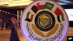 The seal of the Gulf Cooperation Council and an announcement of its meeting this week is on display in Kuwait City, Dec. 4, 2017.
