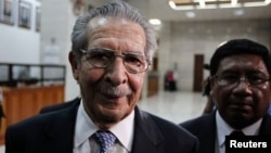 Former Guatemalan dictator Efrain Rios Montt heads out for the day after his trial session at the Supreme Court of Justice in Guatemala City, May 9, 2013.