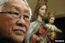 香港天主教会前任枢机主教，86岁的陈日君2018年2月9日在中国香港出席新闻发布会。