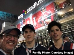 Ivan Baquerizo with sons Ivan Jr. and Rafael.