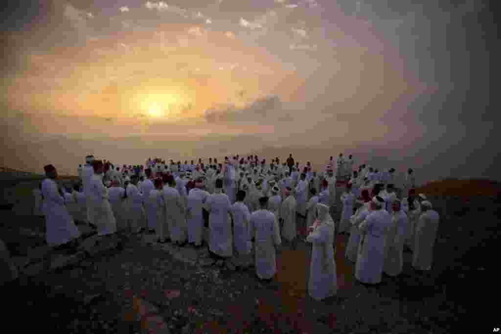 Members of the ancient Samaritan community pray during the holiday of Shavuot on Mount Gerizim near the West Bank town of Nablus.