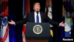 FILE - U.S. President Donald Trump participates in the Missile Defense Review announcement at the Pentagon in Arlington, Va., Jan. 17, 2019.