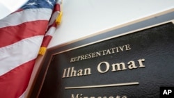 A sign marks the office of incoming Rep. Ilhan Omar, a freshman Democrat representing Minnesota's 5th Congressional District, in the Longworth House Office Building, on Capitol Hill in Washington.