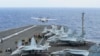 Barcos y aviones buscan a 3 marinos de EE.UU. tras accidente