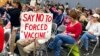 13 Ekim 2021 - New Hampshire eyaletinin Concord kentinde toplanan bir grup, Başkan Joe Biden'ın federal taşeronların çalışanlarına aşı zorunluluğu getirilmesini protesto etti. 