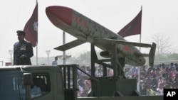 Pakistan's nuclear-capable air-launched "Ra'ad" cruise missile is driven past during the National Day military parade in Islamabad, Mar 23, 2008 (file photo)