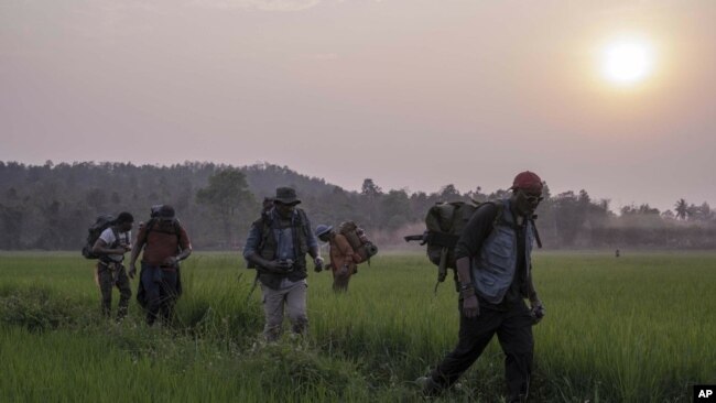 This image released by Netflix shows a scene from the Spike Lee film "Da 5 Bloods." (David Lee/Netflix via AP)