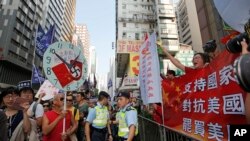 2018年10月1日，香港两派游行集会，有人主张“支持国家，对抗美国，罢买美国”，也有人主张香港独立或“为法西斯强国送终”。