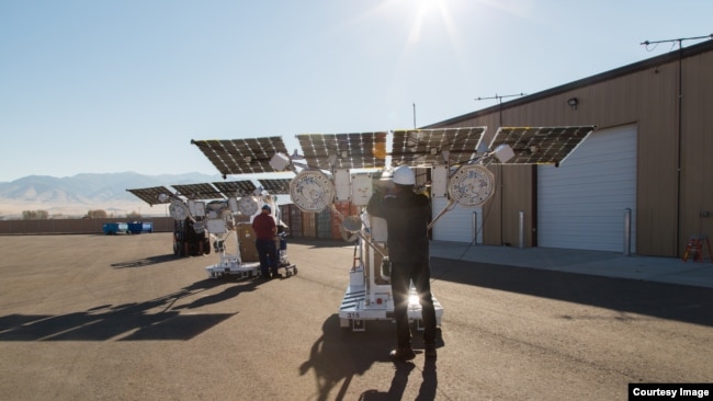 This photo shows Loon team members working on the solar-powered equipment that sends the high-speed internet signal to the ground in areas with no connectivity. (Source: Loon)
