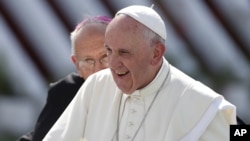 Pope Francis arrives to hold a Mass in Holguin, Cuba, Sept. 21, 2015.