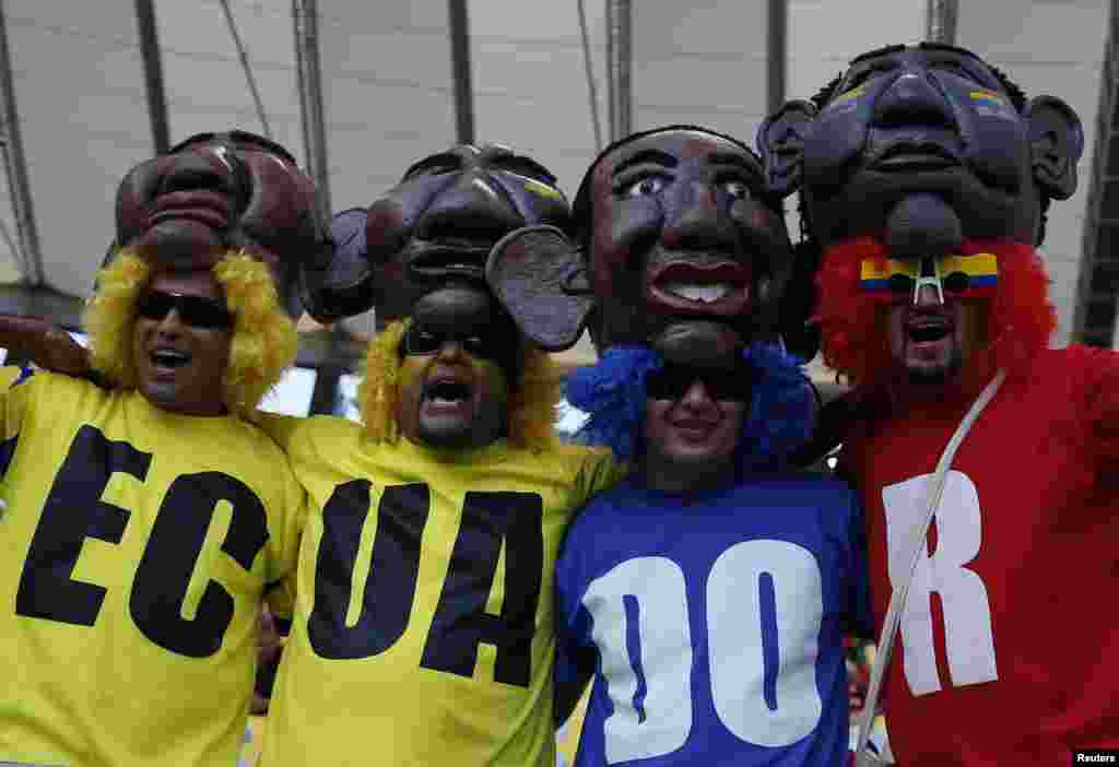 Ecuadorian fans show their support before the match against France at the Baixada arena in Curitiba, June 20, 2014. 