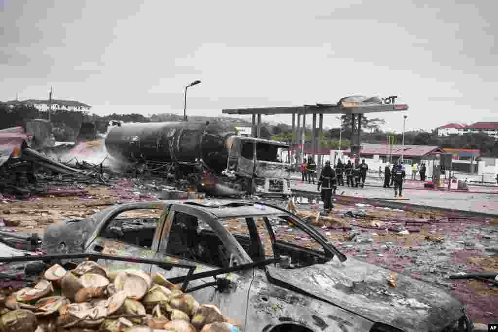 Firemen at the site of Saturday&#39;s gas tanker explosion in Accra, Ghana. Ghana&#39;s deputy information minister says a tanker explosion at a gas-filling station, followed by a secondary blast, has left a number of casualties in the Legon suburb in northwest Accra.