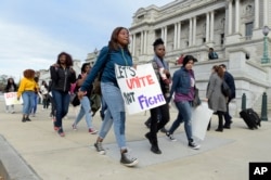 Washington-area high school students near the Library of Congress in Washington protest Donald Trump’s election as president, Nov. 15, 2016.