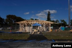 California artist David Best, and a team of volunteers build a non-denominational, temporary temple for the anniversary of the Marjory Stoneman Douglas High School shooting massacre, on Feb. 5, 2019 in Coral Springs, Fla.