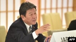 Japan's Foreign Minister Toshimitsu Motegi speaks during the Japan-China-South Korea Foreign Ministers' teleconference at the foreign ministry in Tokyo on March 20, 2020. (Photo by Kazuhiro NOGI / AFP)