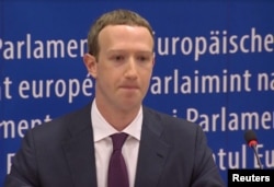 Facebook's CEO Mark Zuckerberg answers questions about the improper use of millions of users' data by a political consultancy, at the European Parliament in Brussels, Belgium, in this still image taken from Reuters TV, May 22, 2018.