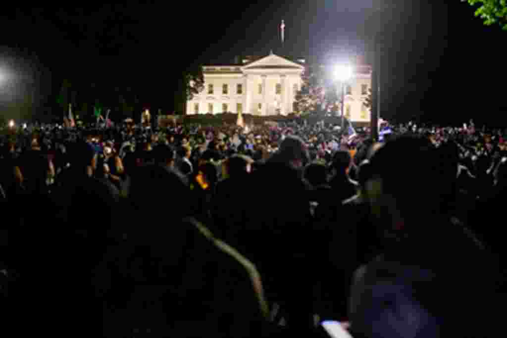 People gather at the White House in Washignton, D.C. to celebrate the death of Osama bin Laden, May 2, 2011.